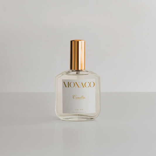 Monaco perfume bottle by Camellia Lux Scents, a luxury-inspired fragrance with warm amber, jasmine, and saffron notes